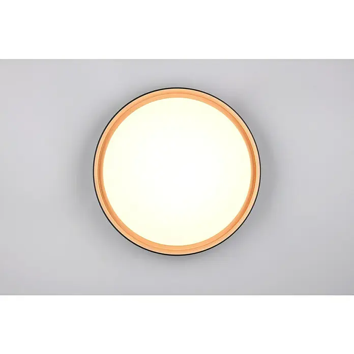 Reality Leuchten LED-Deckenleuchte rund Felis - 24 W, Ø x H: 40 x 7,5 cm, Schwarz/Gold - Nahaufnahme einer runden Deckenleuchte mit einem schwarzen Rand und einer warmen, indirekten Beleuchtung, die eine gemütliche Atmosphäre erzeugt.