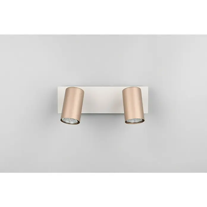 Trio Leuchten Marley Deckenstrahler - 35 W, L x B x H: 9 x 30 x 15 cm, Coffee, GU10 - Wandleuchte mit zwei goldfarbenen zylindrischen Strahlern auf einer weißen rechteckigen Basis, die ein elegantes und modernes Design bietet.