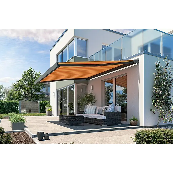 Solid Elements Vollkassettenmarkise Solid-X-Compact 320180 - Gelb/Orange, Farbe Gestell: Anthrazitgrau, Breite: 4 m, Ausfall: 3 m - Die Bild zeigt eine moderne Terrassenüberdachung mit einem orangefarbenen Stoff, die Schatten spendet und den Außenbereich aufwertet.