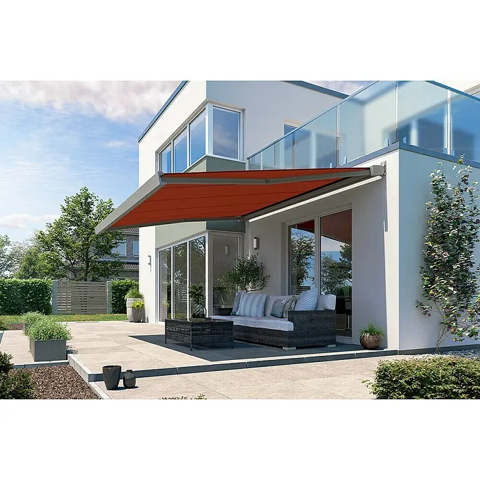 Solid Elements Vollkassettenmarkise Solid-X-Compact S-2209 - Rot, Farbe Gestell: Graualuminium, Breite: 3,5 m, Ausfall: 3 m - Eine moderne Terrassenüberdachung in Rostrot schützt eine Lounge-Ecke mit Sofa und Tisch vor der Sonne und bietet einen stilvollen Schattenspender.