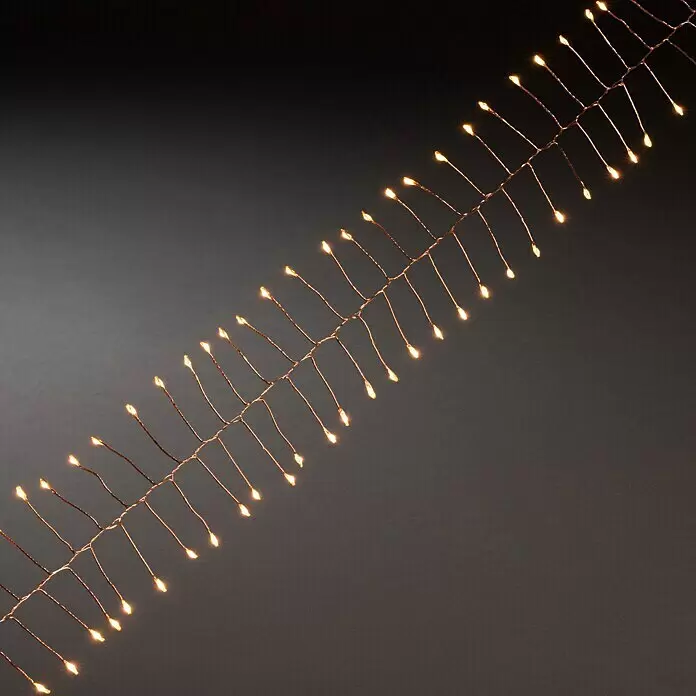 Konstsmide LED-Lichterkette Micro LED Firecracker - Innen, Lichtfarbe: Bernstein, Anzahl Leuchtmittel: 200 Stk., Netzbetrieben, Kupfer - Diagonale Lichterkette mit warmweißen LEDs an Kupferdraht.