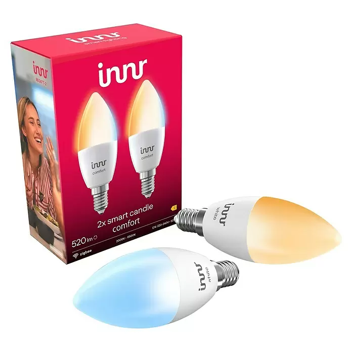 Innr Lighting Smart-LED-Lampe Candle Comfort - E14, Dimmbar, Kaltweiß, 520 lm, 4,6 W, 2 Stk. - Innr Smart Candle Comfort 2er-Pack. Rosa Box mit zwei weißen E14 Smart-Lampen, eine mit warmem, eine mit kühlem Licht.