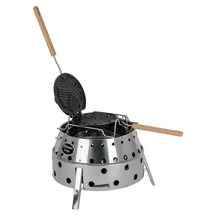 Petromax Waffeleisen zum Wenden - L x B: 54 x 22 cm, Gusseisen - Petromax Atago Edelstahl-Grill/Feuerschale mit eingesetztem schwarzem gusseisernem Herzwaffeleisen.