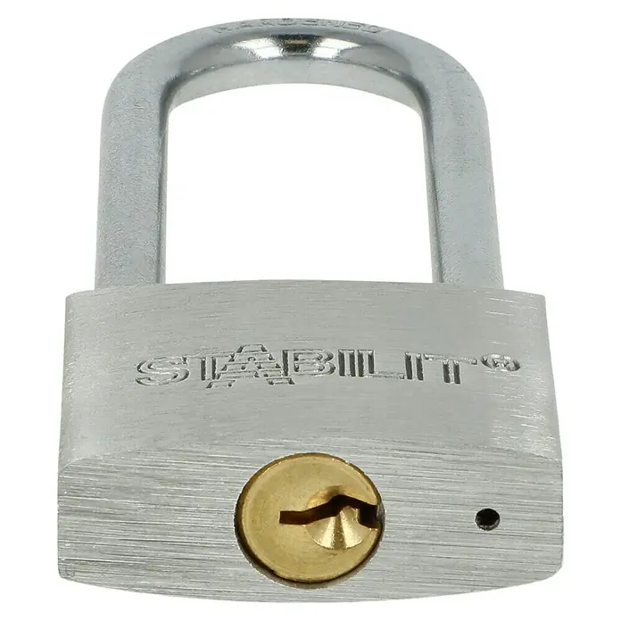 Stabilit Vorhängeschloss A40-63 - 40 x 102 mm, 1 Stk., Aluminium - Nahaufnahme eines silbernen "Stabilit"-Vorhängeschlosses mit einem goldenen Schlüsselloch vor einem schwarzen Hintergrund.