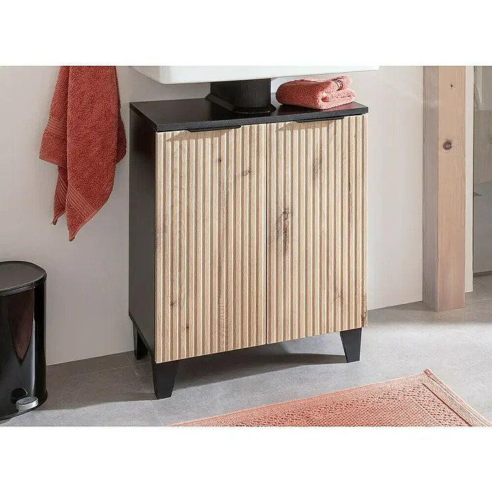 Riva Badmöbel-Set Rigato - 58,5 cm, Eiche/Schwarz, Strukturiert - Badezimmerschrank mit geriffelten Holzfronten und dunkler Arbeitsplatte. Der Unterschrank bietet Stauraum und ein modernes Design für das Bad.