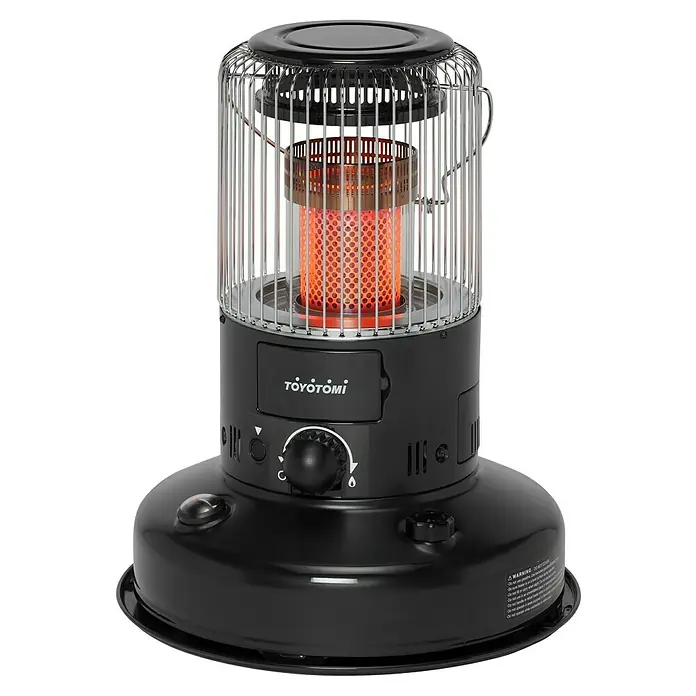 Toyotomi Estufa de parafina portátil KS-R26 - 2,6 kW, Volumen del depósito: 6 l, Negro - Un calentador Toyotomi negro con una jaula de seguridad alrededor del elemento calefactor, emitiendo calor. Ideal para calor adicional.