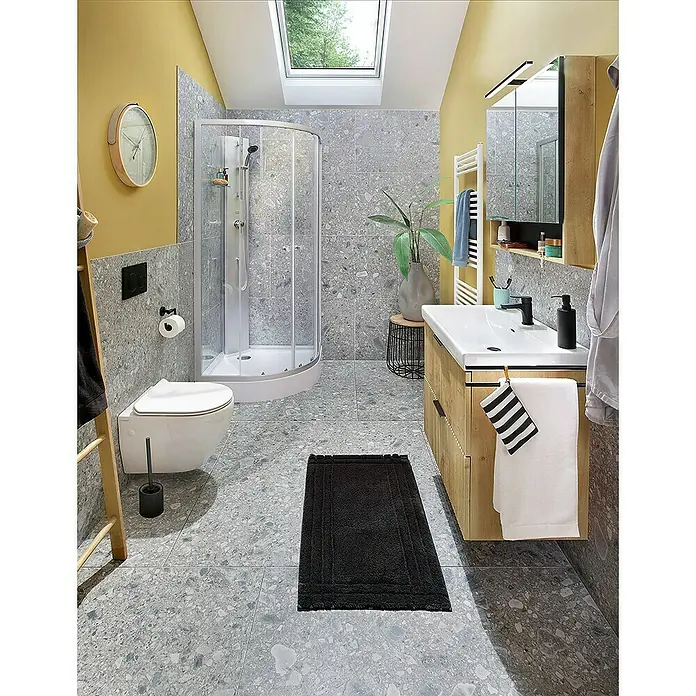 Aurlane Komplettdusche White Sea - 90 x 90 x 210 cm, Weiß/Grau - Modernes Badezimmer mit grauen Fliesen und einem dunklen Badteppich, der einen Farbakzent setzt. Die Einrichtung ist stilvoll und funktional.