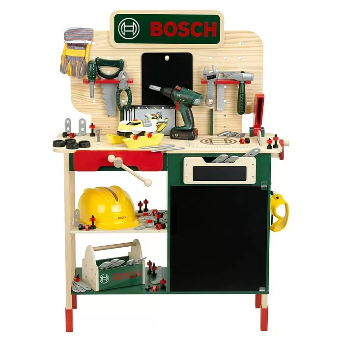 Klein Bosch Kinder-Werkbank -  - Eine hölzerne Bosch Spielwerkbank in Grün, Rot und Gelb, komplett ausgestattet mit Spielwerkzeugen wie Bohrmaschine, Hammer, Säge, Schraubenschlüssel und Schutzhelm.