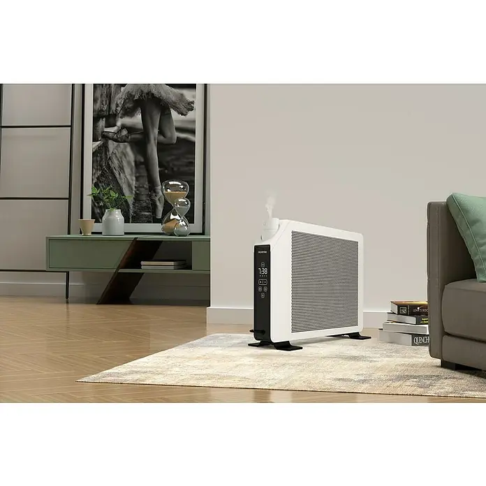 Rointe Convector digital portátil Giro - 2.000 W, 9 x 73 x 45 cm, Blanco - Primer plano de un calefactor blanco con pantalla digital en un elegante salón, que irradia calidez y confort.