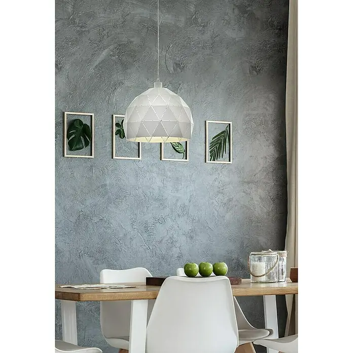 Eglo Roccaforte Lámpara colgante redonda - Altura: 110 cm, Blanco - Una lámpara colgante moderna con un diseño geométrico cuelga sobre una mesa de comedor decorada con manzanas verdes. La lámpara emite una luz suave.