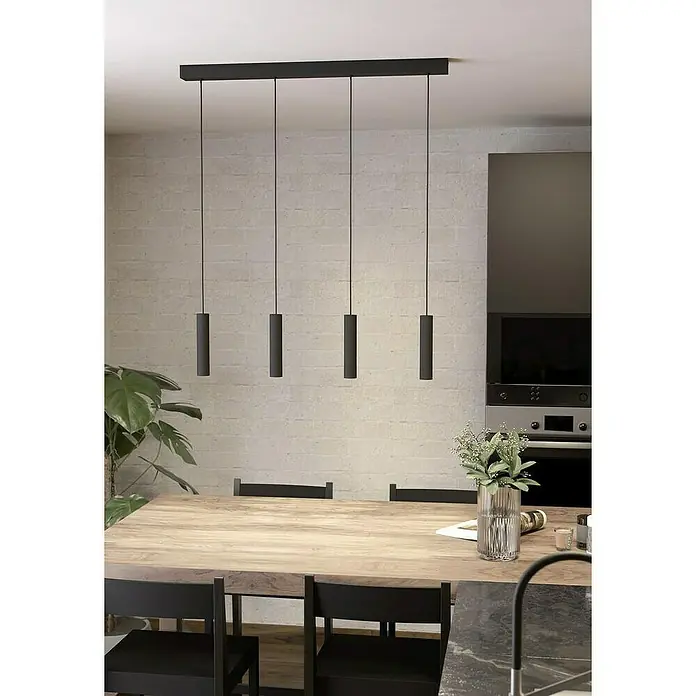 Eglo Lámpara colgante LED Almudaina - 5,4 W, L x An x Al: 82 x 6 x 110 cm, Negro, Blanco cálido, 4 ud. - Elegante comedor con una lámpara colgante moderna sobre una mesa de madera y sillas negras.