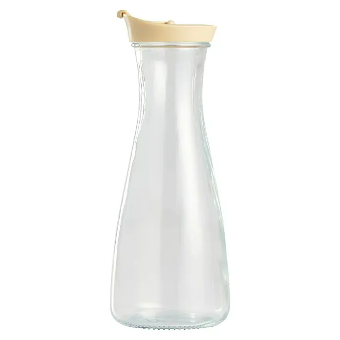 Jarra con tapa - Vidrio, Arena natural/Verde musgo/Amarillo arena, 1 ud. - Elegante jarra de vidrio con tapa beige, perfecta para servir bebidas. Su diseño claro complementa cualquier decoración de mesa.