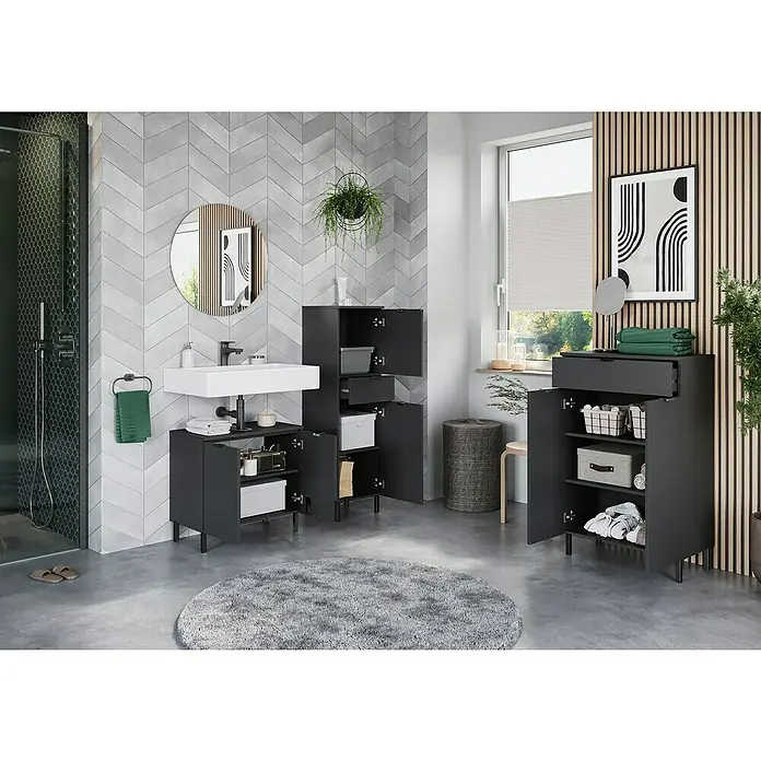 Germania Arcena Waschtischunterschrank - B x T x H: 60 x 34 x 56 cm, Graphit, Matt - Badezimmer-Interieur mit schwarzen Waschtischunterschränken, einem runden Spiegel und einem Teppich. Moderne Badezimmergestaltung mit stilvollen Möbeln.