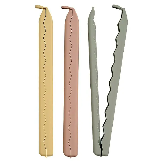 Juego de pinzas para bolsas XL - 6 ud. - Tres palos de clip en oro, rosa y gris. Los palos de clip son resellables y mantienen los alimentos frescos.