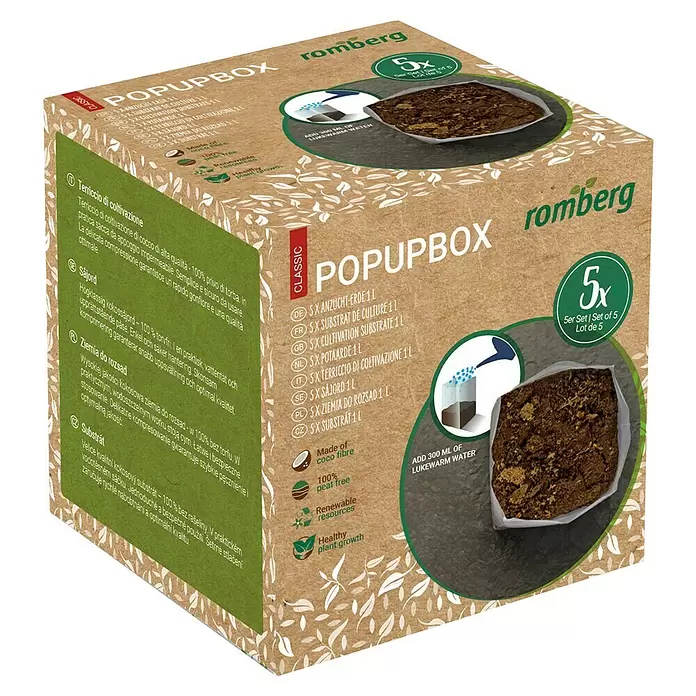 Romberg Aussaat- & Kräutererde Popup Box - 5 -tlg. - Romberg POPUPBOX: braune Box mit 5 Kokosfaser-Substratblöcken, die mit Wasser für Pflanzenwachstum gezeigt werden.