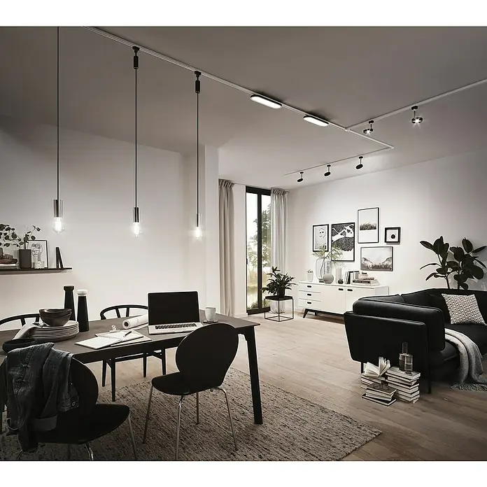 Paulmann URail Gleiter - 50 cm, Metall, Signalweiß - Wohnzimmer mit Esstisch und Sofa unter einer modernen Schienenbeleuchtung mit Hängelampen.