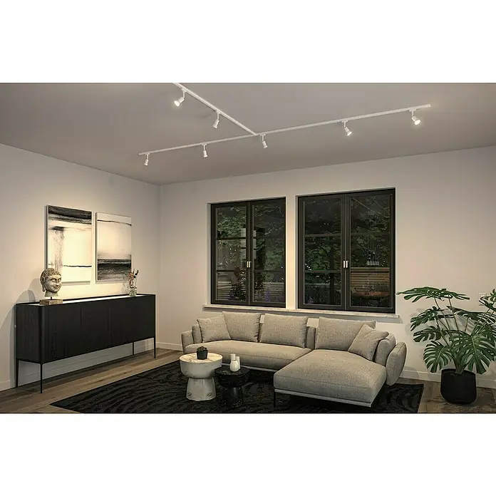 Paulmann URail LED-Spot Salt - 10 W, Signalweiß, 3,5 x 4,5 x 11,3 cm - Elegantes Wohnzimmer mit einer modernen Schiene mit Strahlern, die den Raum beleuchten und ein stilvolles Ambiente schaffen.