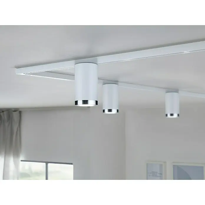 Paulmann URail LED-Spot Tube - Signalweiß, GU10, Ø x H: 6,5 x 12,8 cm - Elegante weiße LED-Deckenleuchten mit silbernen Akzenten, montiert an einer modernen Schiene für stilvolle Beleuchtung.