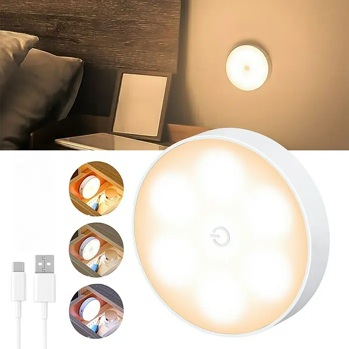 Tween Light Akku-Unterbauleuchte - Weiß, Mehrfarbig - Bild einer runden LED-Leuchte mit USB-Kabel, die an einer Wand und in Schubladen gezeigt wird. Ideal für Schlafzimmer oder Schränke.