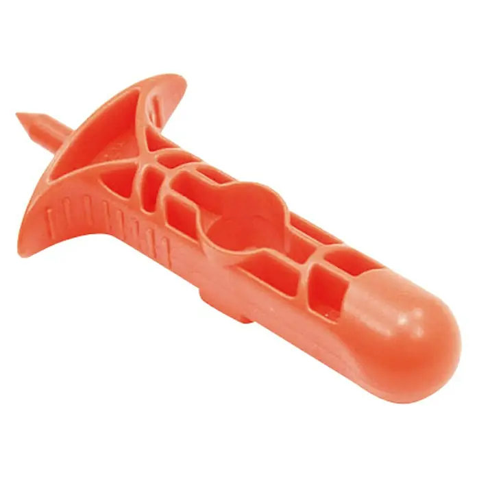 Punzón - Diámetro: 4 mm, Plástico - Primer plano de un taco de pared hueca de plástico naranja, ideal para fijar objetos a las paredes de forma segura.