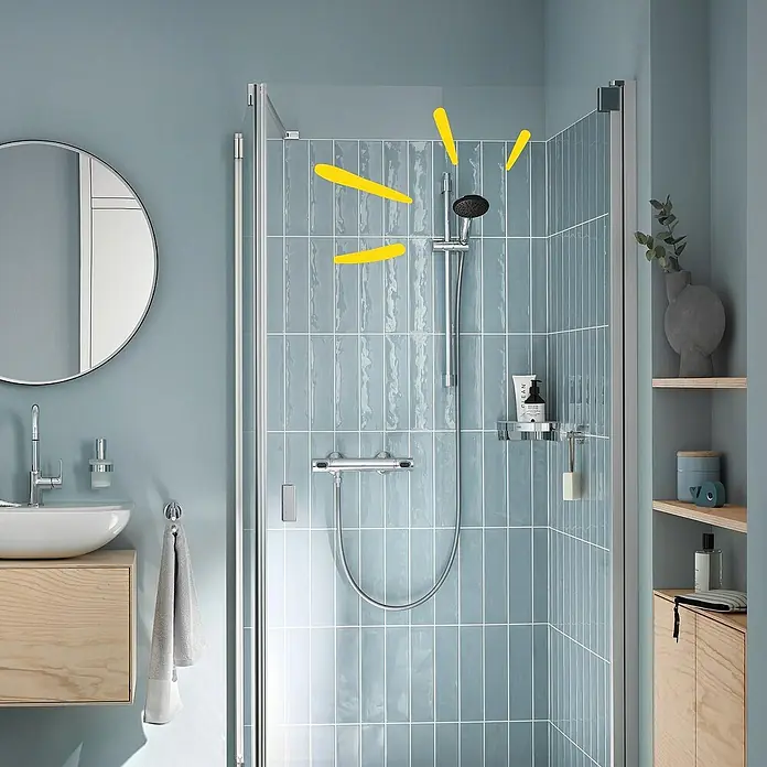 Grohe QuickFix Vitalio Start Teleducha 110 - Número de funciones: 1 ud., Cromo - El baño moderno cuenta con una elegante mampara de ducha con azulejos azules que realza el diseño elegante del espacio.
