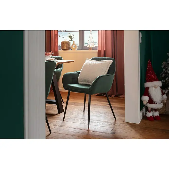 Phönix Stuhl Chessy - L x B x H: 60 x 62 x 82 cm, Grün - Ein grüner Polsterstuhl mit Kissen steht an einem Holztisch und ist eine bequeme Sitzgelegenheit.
