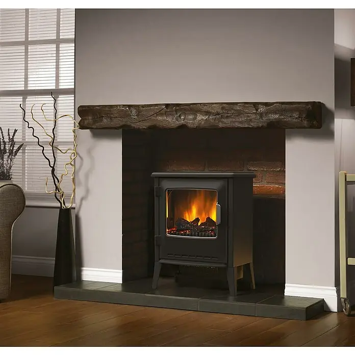Dimplex Chimenea eléctrica Lucia - Negro, 900 W - 1.800 W, 34,4 x 50,8 x 59,7 cm - Estufa eléctrica en salón con viga de madera y decoración, creando un ambiente cálido y acogedor.