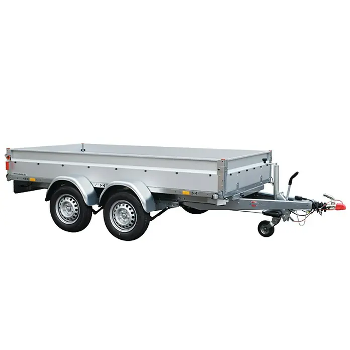 Stema Anhänger BASIC ST 2700-30-15.2 - Nutzlast: 2.275 kg, Doppelachser, Kasteninnenmaß: 301 x 153 x 35 cm, Gebremst - Ein detailreiches Bild eines silbernen Anhängers mit Doppelachse und hochklappbarer Ladefläche, ideal für vielfältige Transportaufgaben.