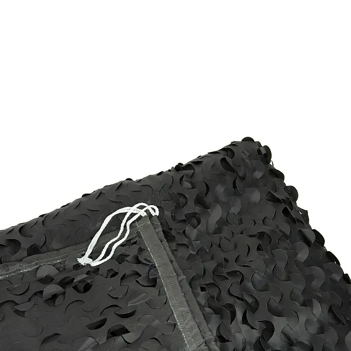 Faura Toldo vela Camuflaje - L x An: 3 x 4 m, Negro - Primer plano de una red de camuflaje negra con un patrón recortado y cordón blanco, ideal para la caza o la decoración.