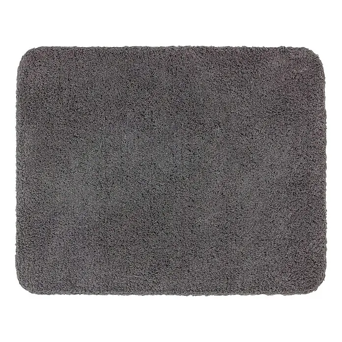 Astra Schmutzfangmatte entra SAUGSTARK - Dunkelgrau, 60 x 75 cm, Material Nutzschicht: 100 % Baumwolle - Nahaufnahme einer rechteckigen, dunkelgrauen Badematte mit abgerundeten Ecken und flauschiger Textur auf einem weißen Hintergrund.