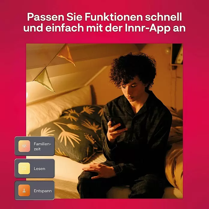 Innr Lighting Dimmcontroller Button kabellose Steuerung - Weiß - Eine Person passt Smart-Home-Funktionen mit der Innr-App schnell für Familienzeit, Lesen und Entspannen an.