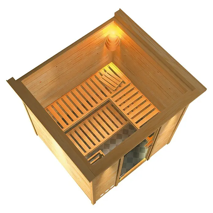 Karibu Elementsauna Mojave - Mit 9 kW Ofen mit externer Steuerung, Mit Dachkranz und Beleuchtung, Materialspezifizierung Tür: Ganzglas Bronze, L x B x H: 224 x 210 x 192 cm - Innenansicht einer Holzsauna mit Bänken, Heizung und Glasfront.