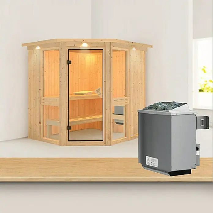 Karibu Elementsauna Amelia 1 - Mit 9 kW Ofen mit integrierter Steuerung, Mit Dachkranz und Beleuchtung, L x B x H: 210 x 184 x 192 cm - Eine Innenaufnahme einer Sauna mit Holzwänden und einer Heizung mit Steinen obenauf, die Wärme für ein entspannendes Saunaerlebnis liefert.