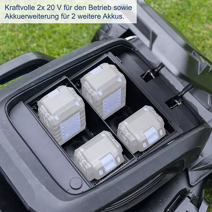 Scheppach IXES 20V Akku-Rasenmäher BC-MP470-X Set - 40 V, 4 Akkus, 4 Ah, Schnittbreite: 470 mm - Vier hellgraue Akkus in einem schwarzen Geräteschacht mit Platz für zwei weitere. Bietet 2x 20V Leistung.