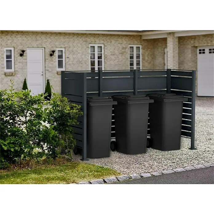 Metzler Mülltonnenverkleidung - 245 x 85 cm, Stahl, Anthrazit, Geeignet für Anzahl Mülltonnen: 3 Stk. - Mülltonnenbox aus Metall in Anthrazit mit drei schwarzen Mülltonnen auf einem Kiesuntergrund.