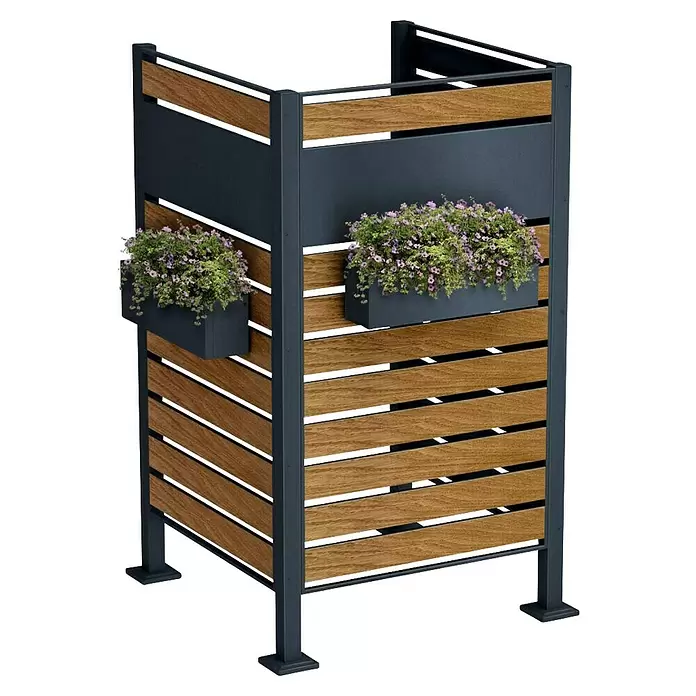 Metzler Mülltonnenverkleidung - 85 x 85 cm, Stahl, Anthrazit/Braun, Geeignet für Anzahl Mülltonnen: 1 Stk. - Moderner Sichtschutz mit dunkelgrauem Metallrahmen, horizontalen Holzlatten und zwei schwarzen Pflanzgefäßen mit lila Blumen.
