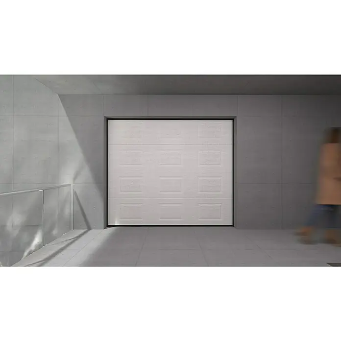 Solid Elements Puerta de garaje seccional PRO - 250 x 212,5 cm, Blanco, Cuarterón - Primer plano de una puerta de garaje blanca con un patrón rectangular en un moderno edificio de hormigón, destacando su diseño elegante.