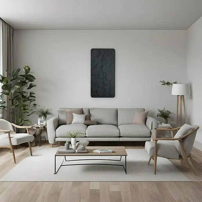 Silenti Akustikpaneel Bubble Game - Anthrazit, 58 x 116 cm, 100 % Polyester - Wohnzimmer mit grauem Sofa, Sesseln und einem Couchtisch auf einem hellen Teppich. An der Wand hängt ein dunkles Kunstwerk mit Kreismuster.