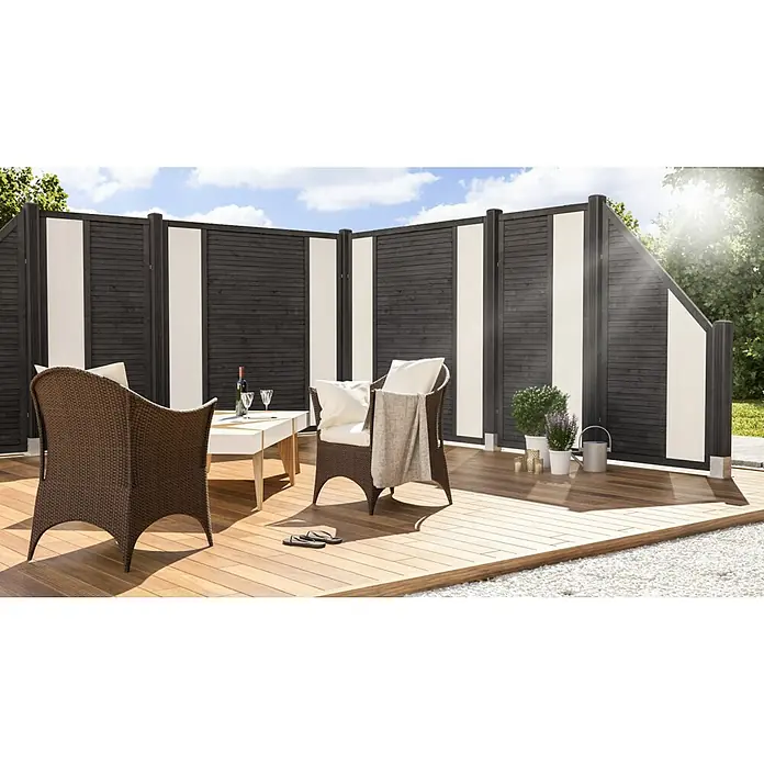 Andrewex Sichtschutzelement Duo - 180 x 180 cm, Anthrazit - Ein stilvoller Außenbereich mit modernen Sichtschutzelementen, gemütlichen Rattanmöbeln und einem eleganten Tisch für entspannte Stunden im Freien.