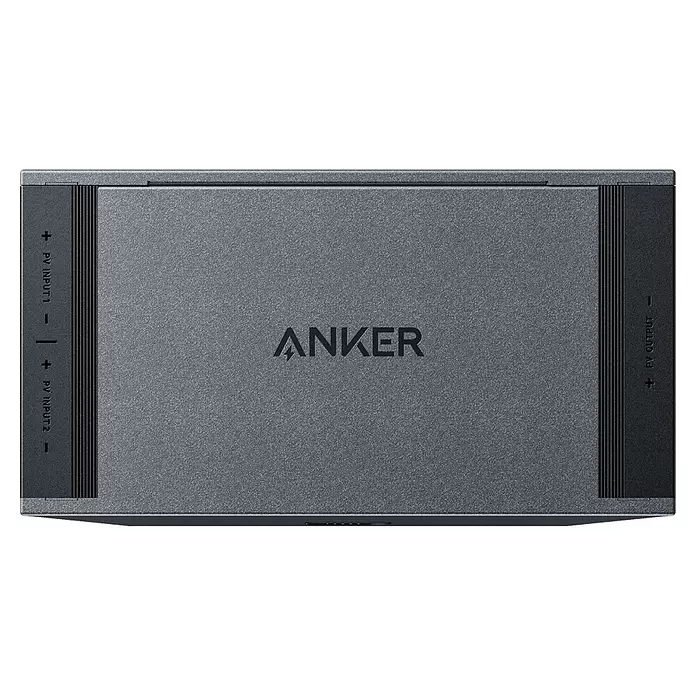 Anker Solix Solarbank E1600 Solarstromspeicher - 0% MwSt. gem. § 12 Abs. 3 UStG - Nennleistung: 1.600 W, Passend für: Balkonkraftwerke - Draufsicht auf ein strukturiertes graues Anker Solarzubehör mit beschrifteten PV-Ein- und Ausgängen.