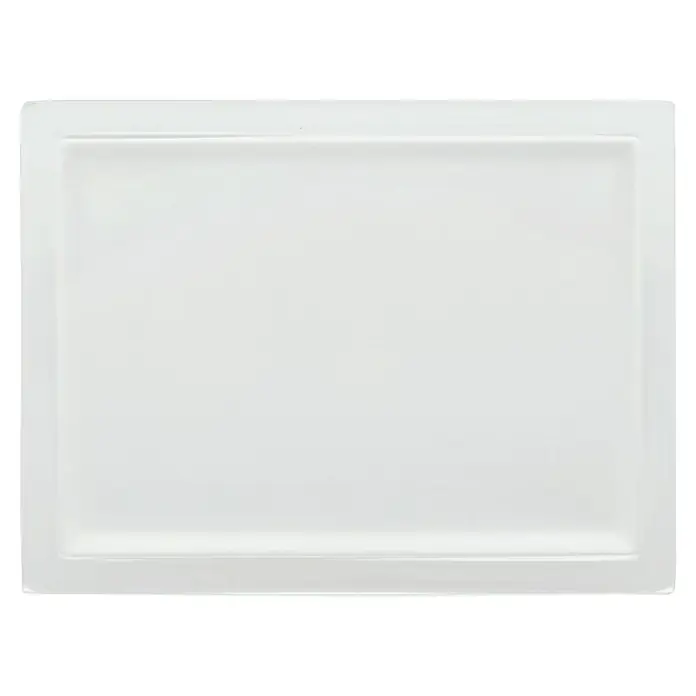 Keuco Edition 11 Ersatzglas - Kristallglas, Glänzend - Nahaufnahme einer rechteckigen, weißen Duschwanne mit erhabenem Rand. Ideal für moderne Badezimmer und barrierefreie Duschen.