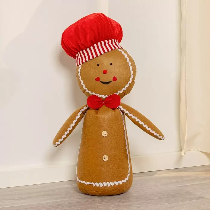 Dekofigur Lebkuchenfigur - Textil, Lebkuchenfigur - Brauner Filz-Lebkuchenmann Türstopper mit roter Kochmütze, Fliege, weißem Zuckerguss und Holzknöpfen.