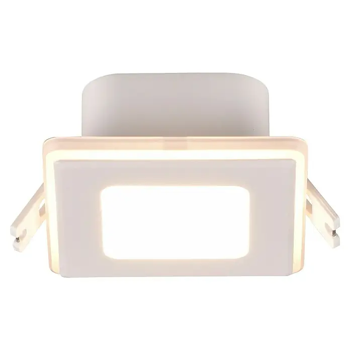 Trio Lighting Foco empotrable Nimbus - Blanco, L x An x Al: 8,5 x 8,5 x 3,9 cm, Blanco cálido - Primer plano de una lámpara de techo LED cuadrada en blanco que emite una luz brillante y moderna, con clips de montaje visibles.