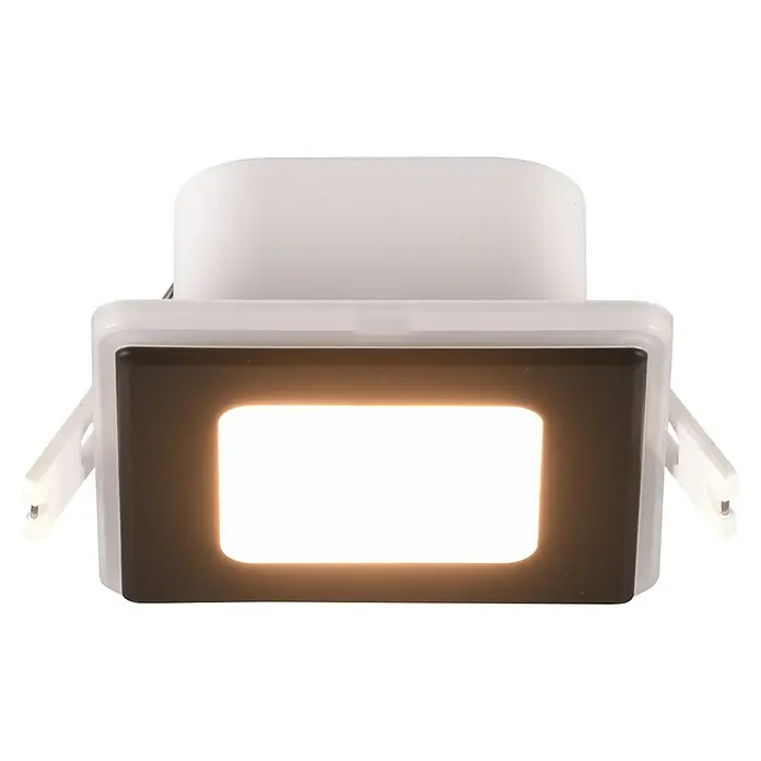 Trio Lighting Foco empotrable Nimbus - Negro, L x An x Al: 8,5 x 8,5 x 3,9 cm, Blanco cálido - Primer plano de una luz LED cuadrada que emite un brillo blanco cálido, perfecta para interiores modernos e iluminación energéticamente eficiente.