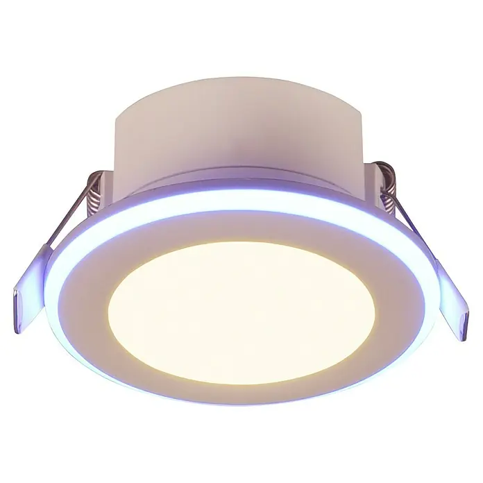 Trio Lighting Foco LED empotrable Argus - RGB, Diámetro: 8 cm, Blanco - Primer plano de una lámpara de techo LED redonda con luz de acento azul y mecanismo de resorte.
