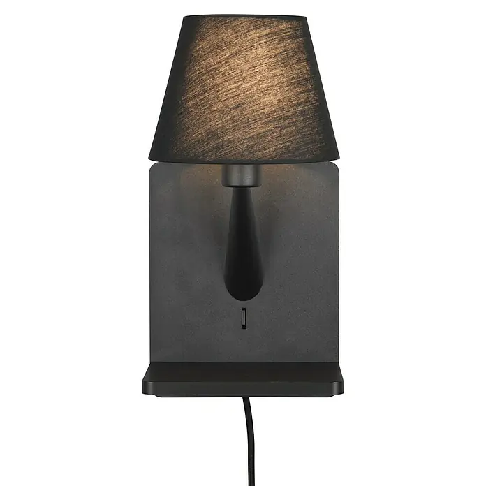 Trio Lighting Aplique de pared Comfort - 40 W, L x An x Al: 18 x 16 x 31 cm, Negro, E14 - Primer plano de una lámpara de pared moderna con una pantalla negra, que emite una luz cálida y suave. El diseño es elegante y minimalista.