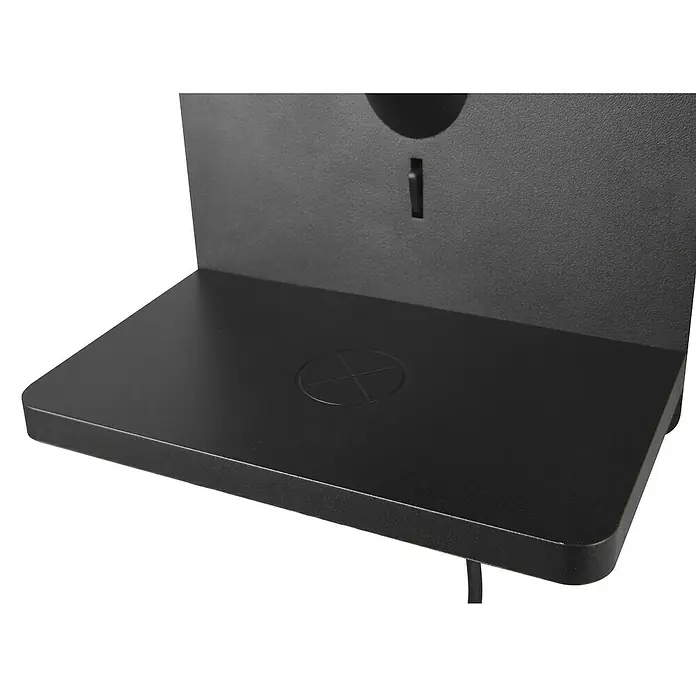 Trio Lighting Aplique de pared Comfort - 40 W, L x An x Al: 18 x 16 x 31 cm, Negro, E14 - Primer plano de una estación de carga negra con una superficie elegante y moderna y una plataforma de carga inalámbrica integrada.
