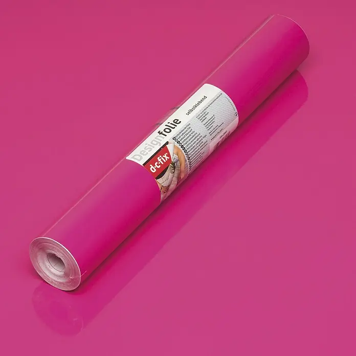 D-c-fix Rollo adhesivo - 200 x 45 cm, Magenta, Autoadhesivo - Primer plano de un rollo de lámina decorativa autoadhesiva rosa de d-c-fix, ideal para decorar muebles y superficies.