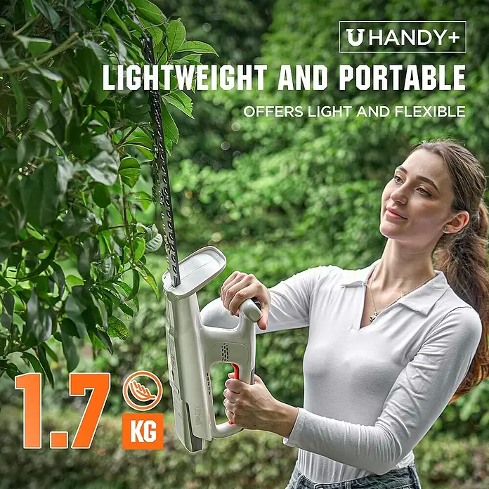 Litheli U20 Akku-Heckenschere Handy+ - 20 V, Li-Ionen, 1 Akku, Schnittlänge: 400 mm - Frau trimmt einen Busch mit einer weiß-orangen Akku-Heckenschere, hervorgehoben durch ihr leichtes 1,7 kg Design.