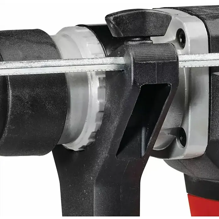 Einhell Martillo combinado TE-RH 32-1600 4F - 1.600 W, 4,5 J, Alojamiento SDS-Plus - Primer plano de un taladro que destaca la mecánica precisa y el diseño duradero de la herramienta.
